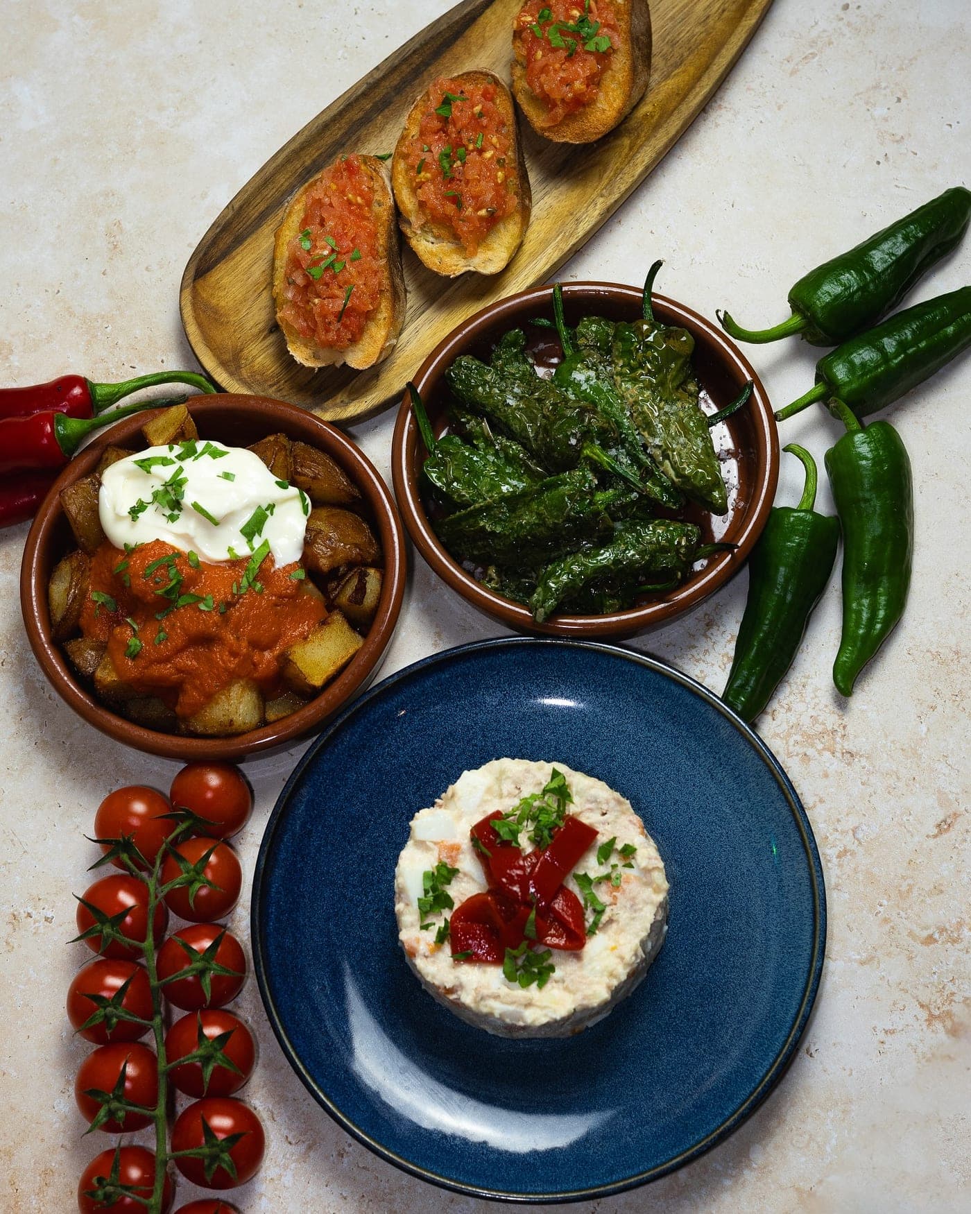 Ensaladilla rusa, patatas bravas and pimientos del padron